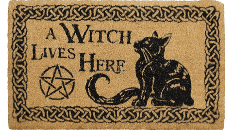A Witch Lives Here doormat